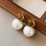 Boucles d'oreilles élégantes en grosses perles