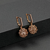 Boucles d'oreilles sphères creuses élégantes et lumineuses