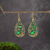 Boucles d'oreilles pendantes vintage vertes brillantes