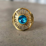 Bague vintage en cristal bleu doré et solaire