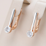 Boucles d'oreilles élégantes en cristal blanc doré et argenté