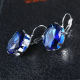 Boucles d'oreilles vintage en argent avec zircone bleue