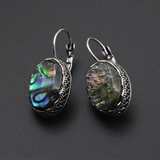 Boucles d'oreilles vintage arrondies avec pierres chromatiques