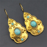 Boucles d'oreilles vintage en or incrustées de turquoise