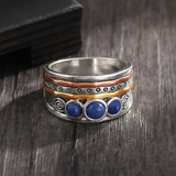 Bague vintage en argent et opale bleue