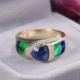 Bague vintage en or avec zircone bleue et verte