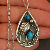 Collier vintage avec pendentif en pierre bleue