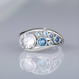 Bague vintage en argent et zircone bleue