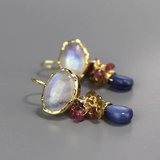 Boucles d'oreilles vintage en or avec pierres blanches