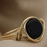 Bague vintage en or avec pierre noire