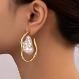 Boucles d'oreilles vintage en or et perles baroques