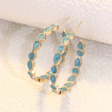 Boucles d'oreilles créoles vintage avec pierres bleues