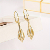 Boucles d'oreilles vintage dorées brillantes