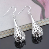 Boucles d'oreilles pendantes vintage en argent creux