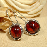 Boucles d'oreilles vintage en pierre rouge brillante