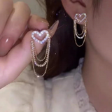Boucles d'oreilles pendantes vintage en forme de cœur brillant