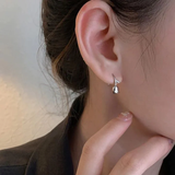 Boucles d'oreilles vintage en argent en forme de rose