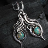 Boucles d'oreilles vintage en argent et opale bleue