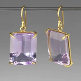 Boucles d'oreilles vintage en or avec zircone violette