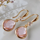 Boucles d'oreilles pendantes vintage en cristal rose