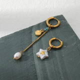 Boucles d'oreilles vintage en or blanc et étoiles