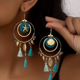 Boucles d'oreilles pendantes vintage bleues