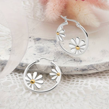 Boucles d'oreilles vintage en argent en forme de marguerite arrondie
