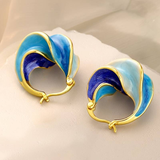Boucles d'oreilles en émail bleu dans de l'or vintage