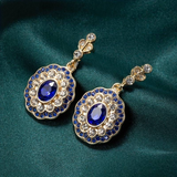 Boucles d'oreilles mandala en cristal bleu sur or vintage