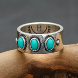 Bague vintage incrustée de pierres bleues