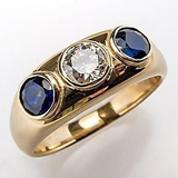 Bague vintage en or avec zircone et incrustation de verre bleu