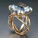 Bague vintage tressée en or et verre bleu