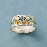 Bague vintage en or et argent avec pierres incrustées bleues