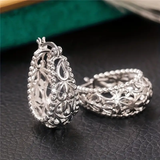 Boucles d'oreilles vintage en argent brillant