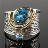 Bague vintage en argent avec pendentif en cristal bleu