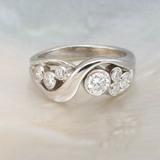 Bague vintage en argent avec zircone en spirale