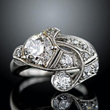 Bague vintage en argent avec spirale brillante