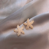 Boucles d'oreilles élégantes en forme d'étoile de mer et perles