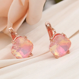 Boucles d'oreilles élégantes en opale rose arrondie