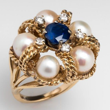 Bague vintage avec zircone bleue et perle