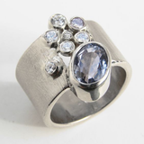 Bague vintage en argent incrustée de verre bleu