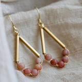 Boucles d'oreilles pendantes vintage en or avec pierres rouges