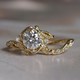 Bague vintage en or avec zircone et motif branche