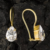 Boucles d'oreilles pendantes vintage en verre blanc incrusté