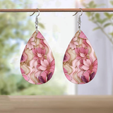 Boucles d'oreilles pendantes vintage en verre rose à motif floral