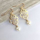 Boucles d'oreilles vintage en spirale avec perles dorées
