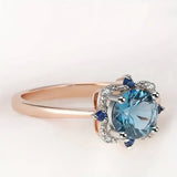 Bague vintage en verre bleu avec rose