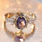 Bague vintage en or avec cristal violet