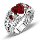 Bague vintage argentée avec cristal rouge