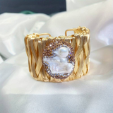 Bracelet vintage en or et pierre blanche